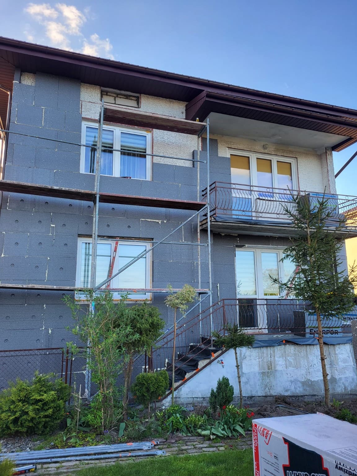 Original traditional house facade before AI transformation